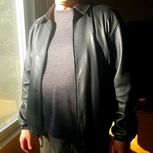 Black leather polo tracker.